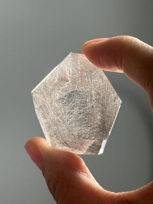 Quartz with Rutile on Stand