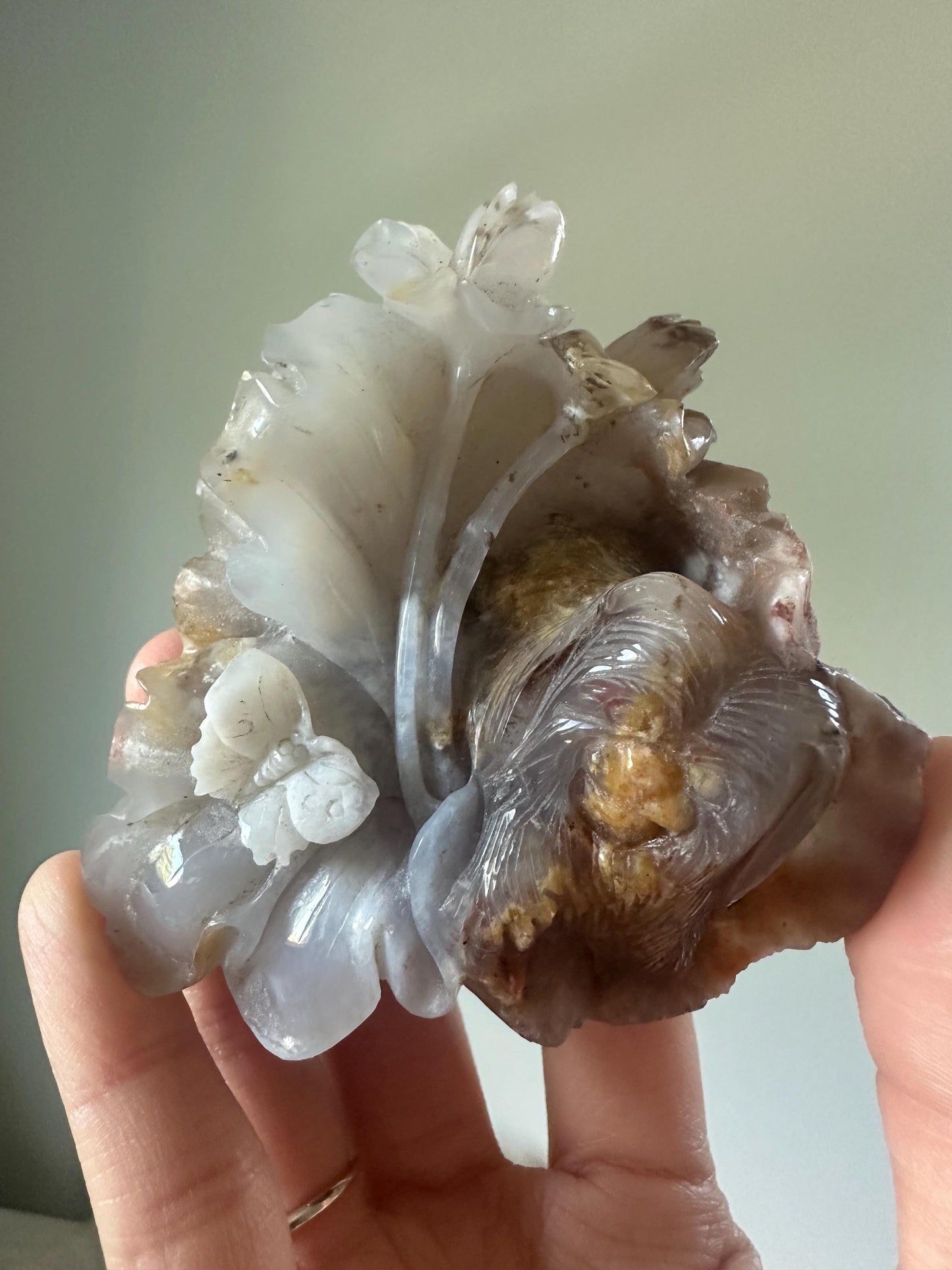 Blue Chalcedony Pekingese with Flowers – Hand-Carved Crystal Dog Figurine, Soft Blue Gemstone Display, Unique Collector or Gift Sculpture
