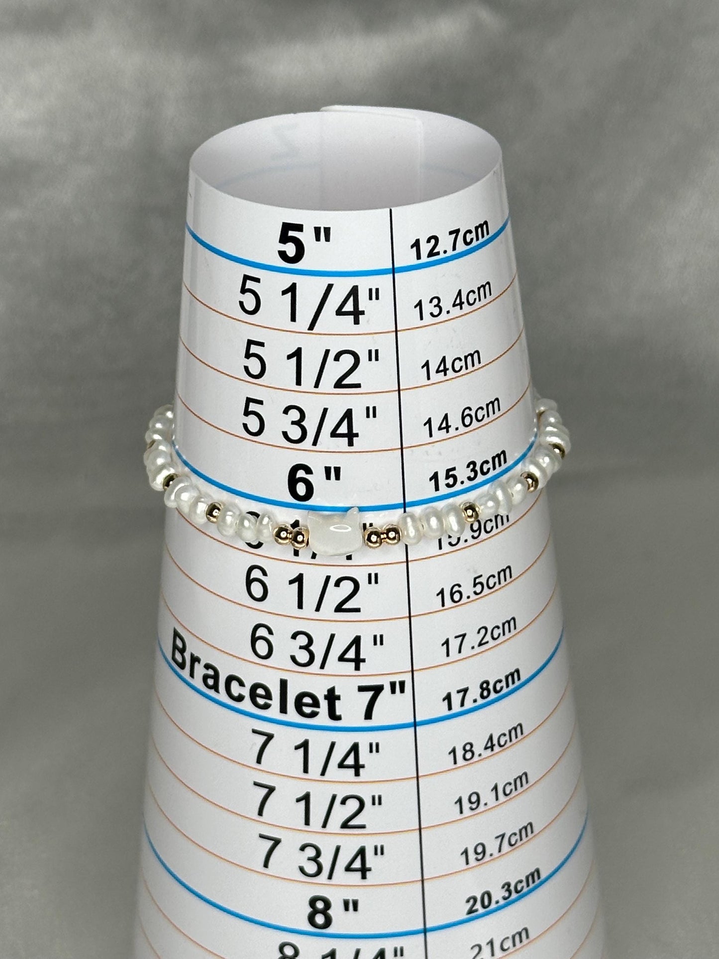 Adjustable Pearl Bracelet with Cat Head Focal Bead & Gold Spacers, Elegant Whimsical Jewelry for Cat Lovers and Feminine Charm